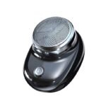 Portable electric shaver with a sleek black design, circular shaving head, and power button